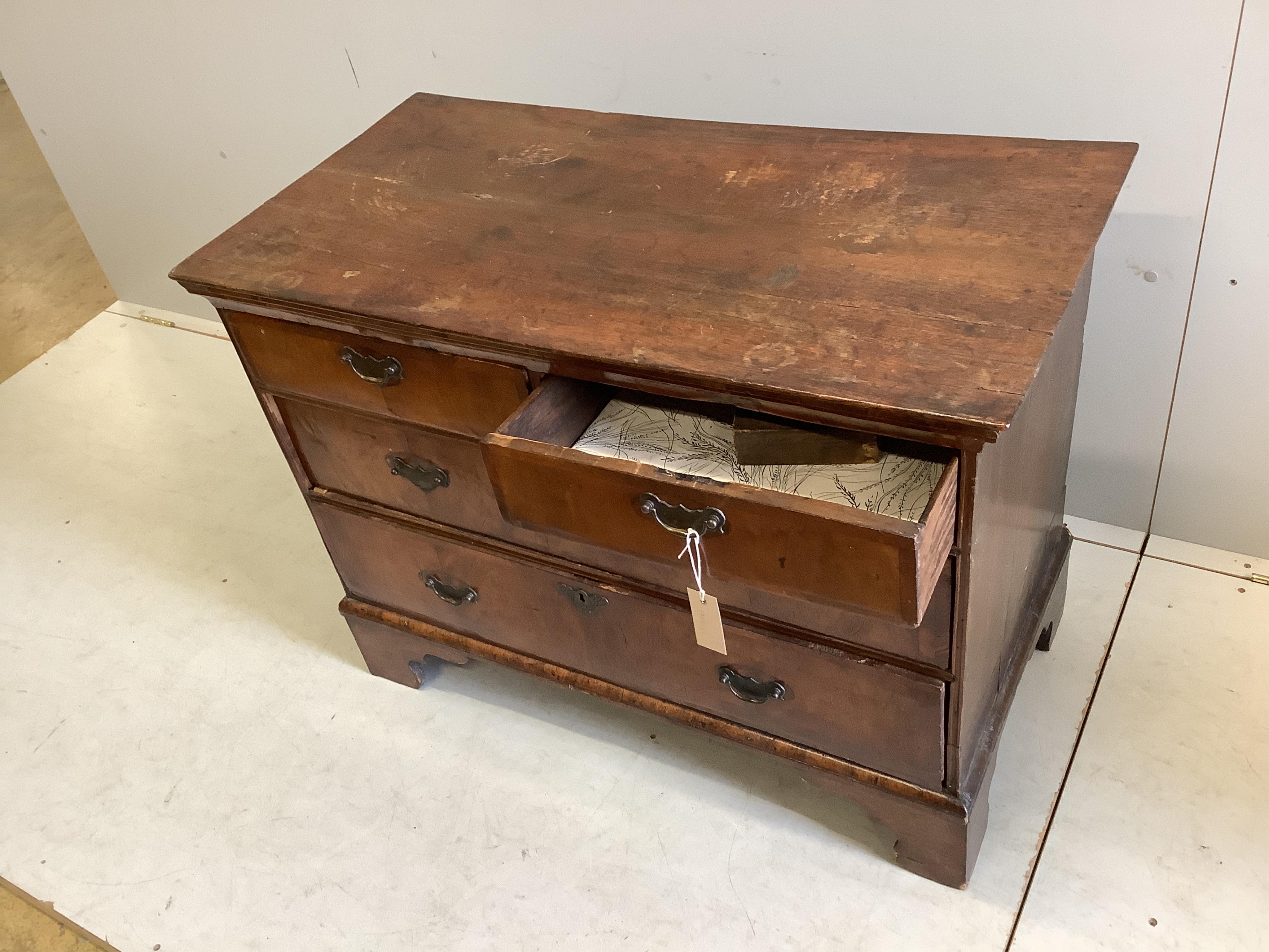 An 18th century walnut chest of four drawers, adapted, width 97cm, depth 50cm, height 73cm. Condition - poor